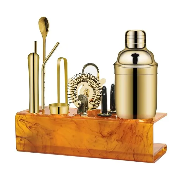 Gouden cocktailshaker set met standaard